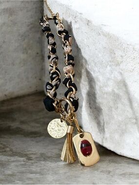 Gold-Plated Necklace with Black & Beige Woven Chain and Red Stone Charm
